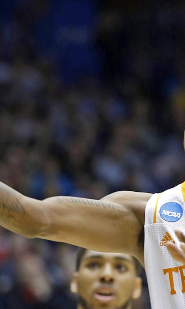 Vols rally to beat Iowa 78-65 in OT at First Four